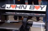 John Buy-в связи с кончиной Джона Уолтона Minardi разместила на задних антикрыльях это послание